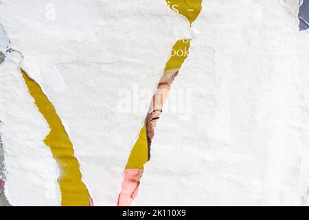 Old grunge torn collage posters creased crumpled paper placard texture background. Ripped faded paper backdrop surface placard Stock Photo