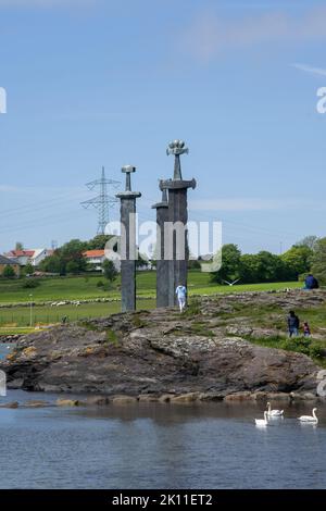 Hafrsfjord, Norway - June 4, 2022:  Sverd i fjell (Swords in Rock) is a commemorative monument located in the Hafrsfjord neighborhood of Madla, Stavan Stock Photo