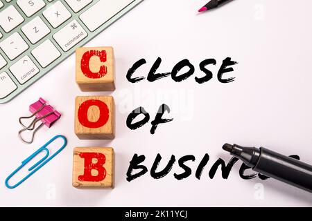 COB - Close of Business. Computer keyboard on the office table. Stock Photo