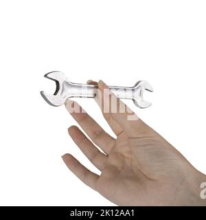 a wrench in a female hand on a white background Stock Photo