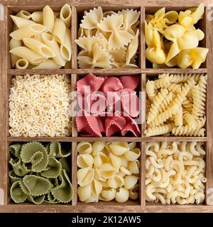 Assorted pasta in a wooden box Stock Photo