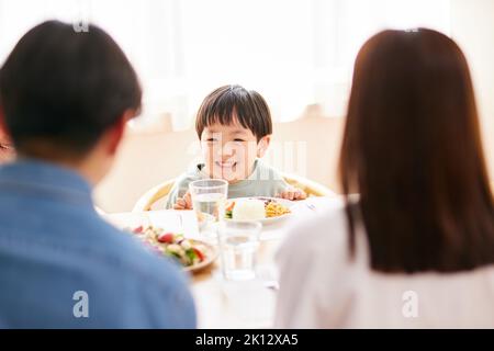 Japanese family eating together at home Stock Photo