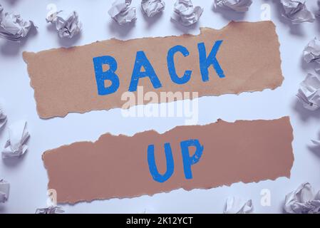 Conceptual caption Back Up. Word for saving important data into internet cloud and restore them later Stock Photo