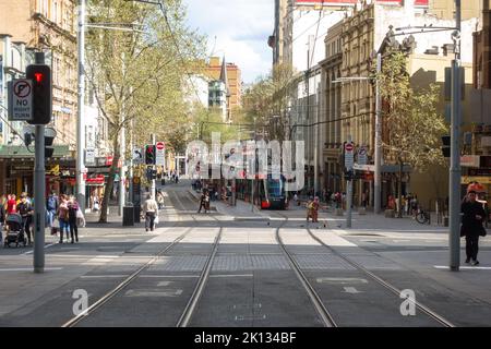 A Line 3 light rail tram at the Chinatown stop on George Street in Sydney Stock Photo