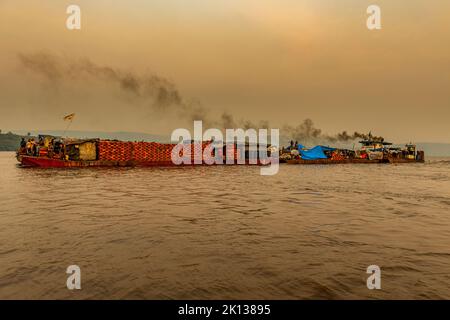 Overloaded riverboat on the Congo River at sunset, Democratic Republic of the Congo, Africa Stock Photo