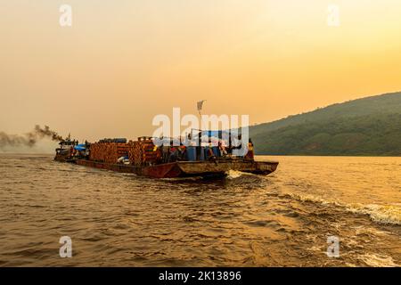 Overloaded riverboat on the Congo River at sunset, Democratic Republic of the Congo, Africa Stock Photo