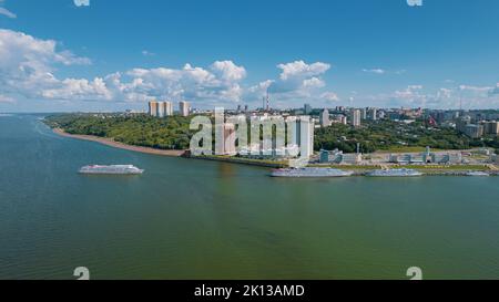Scenic aerial view of Cheboksary, capital city of Chuvashia, Russia and a port on the Volga River on sunny summer day. Stock Photo