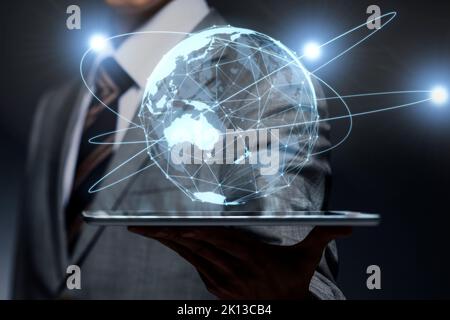 Japanese businessman with CGI world map Stock Photo