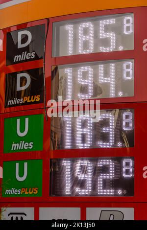 Price board at a filling station showing expensive petrol and diesel prices Stock Photo