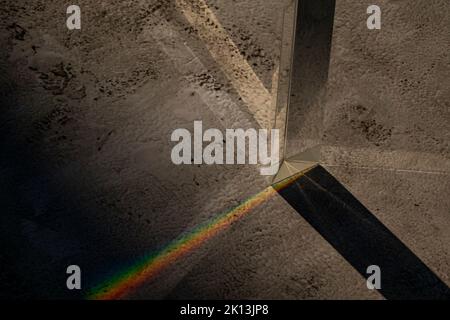 A futuristic cool background with glass prisms and light shadows on a gray surface Stock Photo