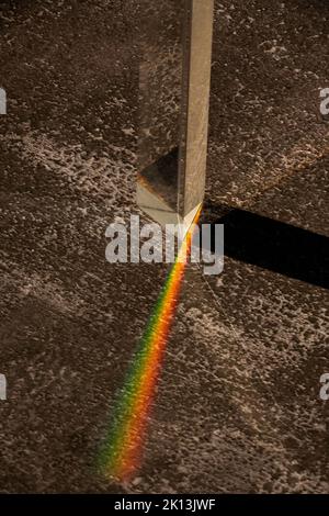 A vertical shot of a futuristic cool background with glass prisms and light shadows Stock Photo