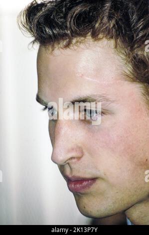 NOTE VISIBLE SCAR. Prince William with his visible golf club scar on