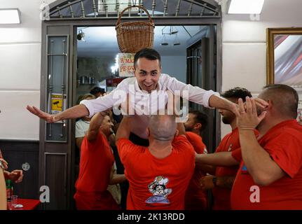 Naples, Italy. 14th Sep, 2022. The leader of the Italian party 'Impegno Civico' and Foreign Minister Luigi Di Maio is carried in the air by the waiters of the folkloristic restaurant Nennella in imitation of the famous ballet staged by Patrick Swayze and Jennifer Gray in the film Dirty Dancing, on the occasion of a visit to the spanish quarter. Credit: Independent Photo Agency/Alamy Live News Stock Photo