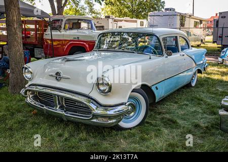 Falcon Heights, MN - June 18, 2022: High perspective front corner view of a 1956 Oldsmobile 88 Holiday Coupe at a local car show. Stock Photo
