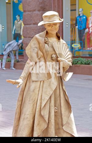 An unidentified busking mime performs on Khreshchatyk street in Kiev, Ukraine Stock Photo