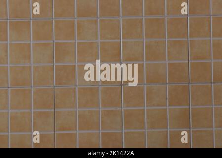 A texture made of sandstone that can be found on the wall of a house Stock Photo