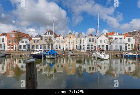 Goes - View to very cute Marina with awsome  reflections on the water, Zeeland, Netherlands, 21.03.2018 Stock Photo