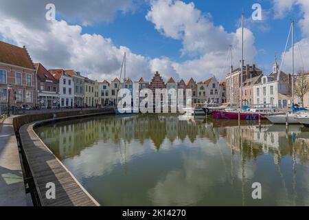 Goes - View to very cute Marina with awsome  reflections on the water, Zeeland, Netherlands, 21.03.2018 Stock Photo