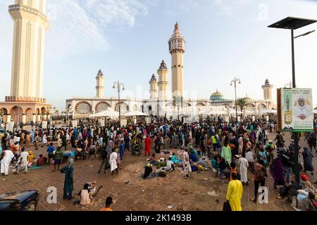 Touba, Senegal. 15th Sep, 2022. Believers have gathered in front of the Great Mosque for one of the world's largest Muslim pilgrimages. The city is considered a holy city of the Muslim brotherhood of the Mourids. They belong to the Sufi current of Islam. (to dpa 'Pilgrimage to the 'West African Mecca' in Senegal has begun') Credit: Stefan Kleinowitz/dpa/Alamy Live News Stock Photo