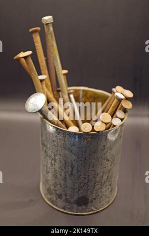 Rusty Nails in a can. Stock Photo
