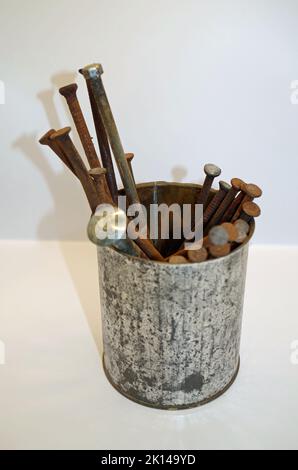 Rusty Nails in a can. Stock Photo