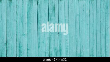 Painted burquoise old wooden fence Stock Photo