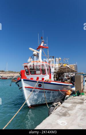 Close up of a colourful traditional Greek fishing boat in Vlichada marina / port, Santorini, Cyclades islands, Greece, Europe Stock Photo