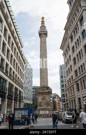 The Monument commemorating the1666 Great Fire of London stands in Monument Square off Fish Street Hill and Monument Street, London, England, UK Stock Photo