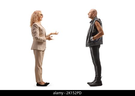 Woman talking to a bald punk man isolated on white background Stock Photo