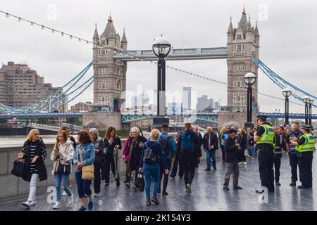 London, UK. 15th Sep, 2022. The queue for Queen Elizabeth II's lying-in-state stretches past Tower Bridge, as people wait for hours to view The Queen's coffin. The coffin has been placed in Westminster Hall in the Palace of Westminster where she will remain until her funeral on 19th September. Stock Photo