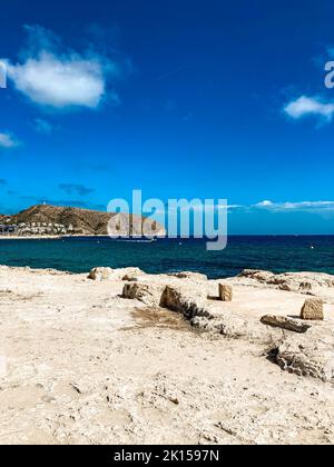 Beautiful scenery of Playa de l'Ampolla beach and sea in Moraira, East Spain Stock Photo
