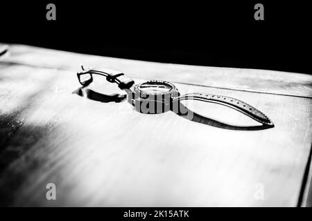 Black and White Watch on a Table Stock Photo