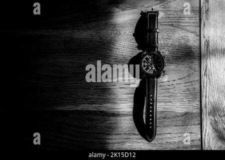 Black and White Watch on a Table Stock Photo