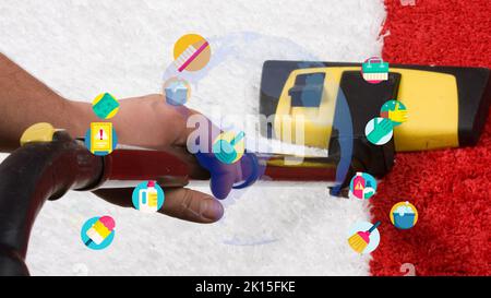 Human Cleaning Carpet In The Living Room Using Vacuum Cleaner At Home Stock Photo