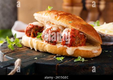 Meatball sub sandwich with marinara and mozzarella Stock Photo