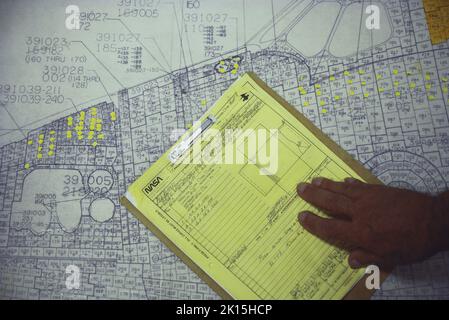 A blueprint at the Kennedy Space Center shows the location and number of each of the heat-shielding tiles on the space shuttle Columbia.  In between missions, technicians would have to locate the tiles that needed to be replaced. Stock Photo