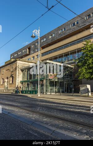 A vertical shot of old and modern buildings and tramways in Dublin Docklands, Ireland. Stock Photo