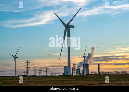 Lignite-fired power plant, RWE Power AG Niederaussem power plant, wind turbines, 2 units shut down in 2020/21 and restarted in June 22 to replace gas- Stock Photo
