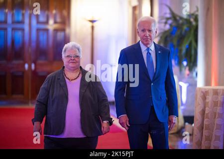 Washington DC, USA. 15th Sep, 2022. President Joe Biden along with Susan Bro prepare to speak at the United We Stand Summit in the East Room of the White House in Washington, DC on Thursday, September 15, 2022. Bro is the mother of Heather Heyer, who was killed at the Unite the Right rally in Charlottesville, Virginia in 2017. Photo by Jim Lo Scalzo/UPI Credit: UPI/Alamy Live News