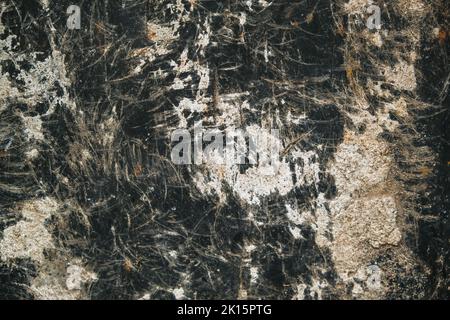 Texture of the black and white background. Golden-white pattern made of natural black stone. black marble texture background. Luxury with a golden pattern of black marble. dark gray. Stock Photo