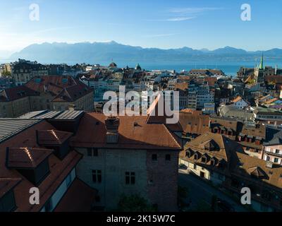 Lausanne, Switzerland, August 22nd 2022. Aerial drone shot of the city centre and lake Geneva in the background. Stock Photo