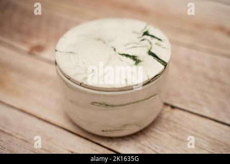 Marble Green and Off White Candle With Lid Stock Photo