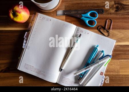 Planner on a Table - Bullet Journal Stock Photo