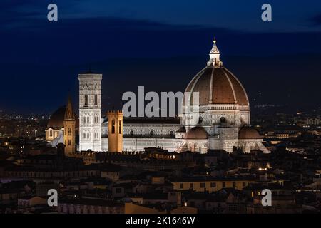 Florence skyline sunset with Cathedral dome - Santa Maria del Fiore Cathedral at dusk from distance - Florence city at night / nightfall cityscape Stock Photo