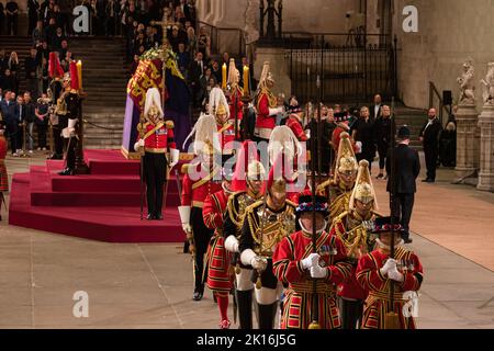 London, UK. 16th Sep, 2022. The last and first changing of the guard of the day at 00:00 as hundreds of visitors bid farewell to the mortal remains of Queen Elizabeth II on the second day of the funeral at Westminster Hall. Credit: SOPA Images Limited/Alamy Live News Stock Photo