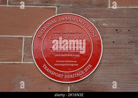 A red plaque marking the site of the former ticket office for the Glasgow Subway, St Enochs Square, now a Cafe Nero coffee shop. August 2022 Stock Photo