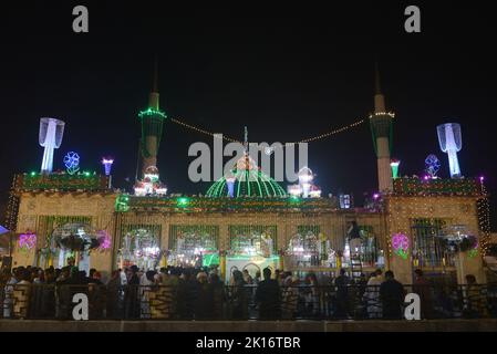 Lahore, Punjab, Pakistan. 15th Sep, 2022. Pakistani Muslim devotees take a part on the 979th annual ''URS'' celebrations at the shrine of Sufi Saint Syed Ali bin Osman Al-Hajvery, popularly known as ''Data Ganj Bakhsh'' in Lahore. Thousands of people traveled from all over Pakistan to attend the celebrations. During the festival at the shrine is lit up with candles, earth lams'' there are donated food for the people and Sufis, who dance and play music for hours. Data Ganj Bakhsh was a Persian Sufi and scholar during the 11th century. He was born in Ghazni, Afghanistan (990 AD) during the Stock Photo