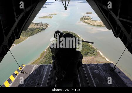 Jacksonville, North Carolina, USA. 31st Aug, 2022. U.S. Marine Corps Staff Sgt. Matthew Jensen, CH-53E Super Stallion crew chief, Marine Heavy Helicopter Squadron (HMH) 366, 2nd Marine Aircraft Wing, sits behind a mounted M2A1 .50-caliber machine gun on a CH-53E Super Stallion on Marine Corps Air Station (MCAS) New River in Jacksonville, North Carolina, August. 31, 2022. HMH-366 aviation maintenance Marines conduct routine preventative maintenance on CH-53E Super Stallion to ensure a constant state of readiness. MCAS New River provides aviation support, force protection, infrastructure, and Stock Photo