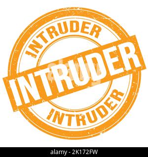 INTRUDER text written on orange round grungy stamp sign Stock Photo