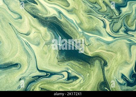 Bright green marble background with dark green waves. Abstract background or texture. Acrylic Fluid Art. High resolution texture. Stock Photo